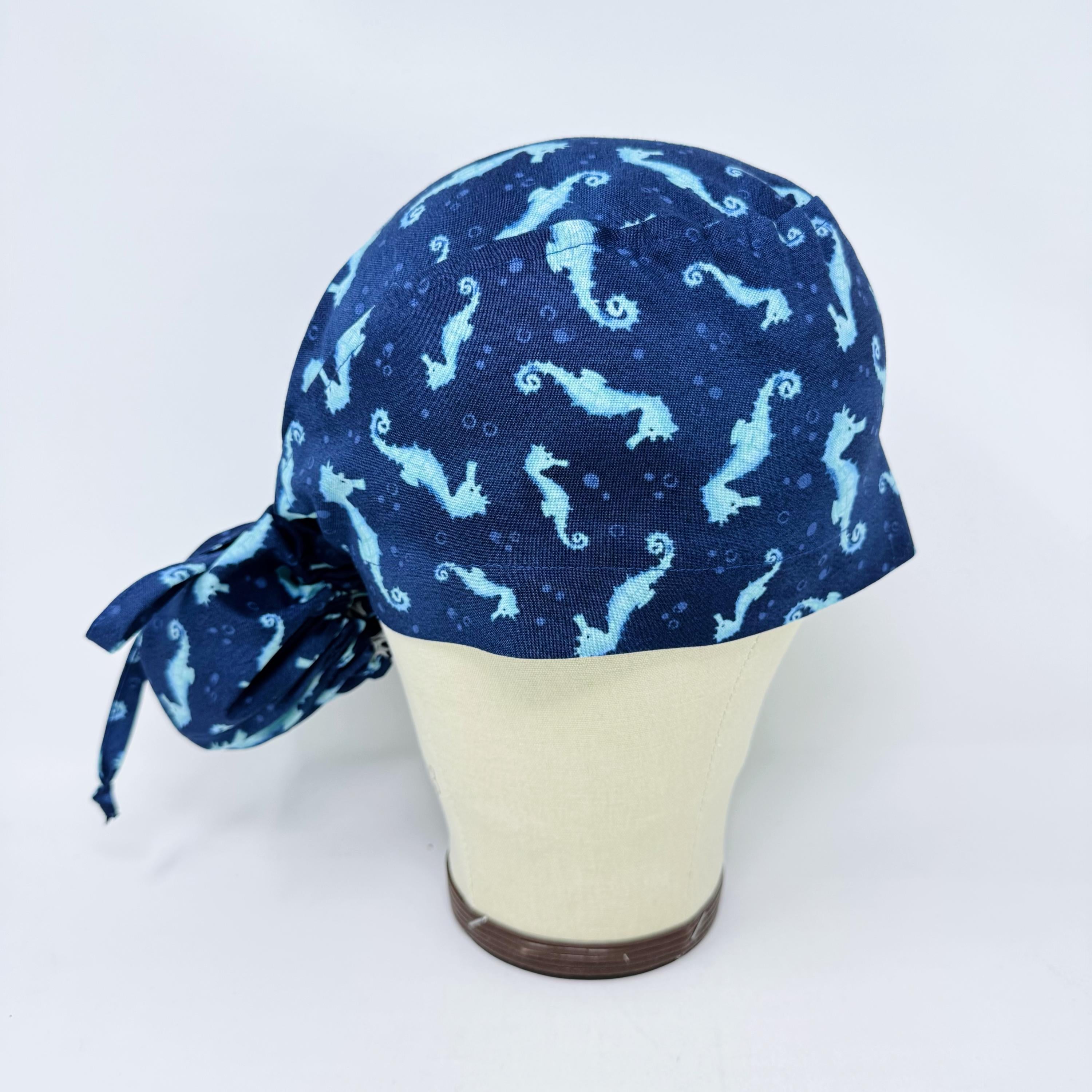 Ponytail scrub cap women. Ocean Seahorse Print Satin Lined option Ponytail scrub hat. Scrub caps for women by Paradise Caps.