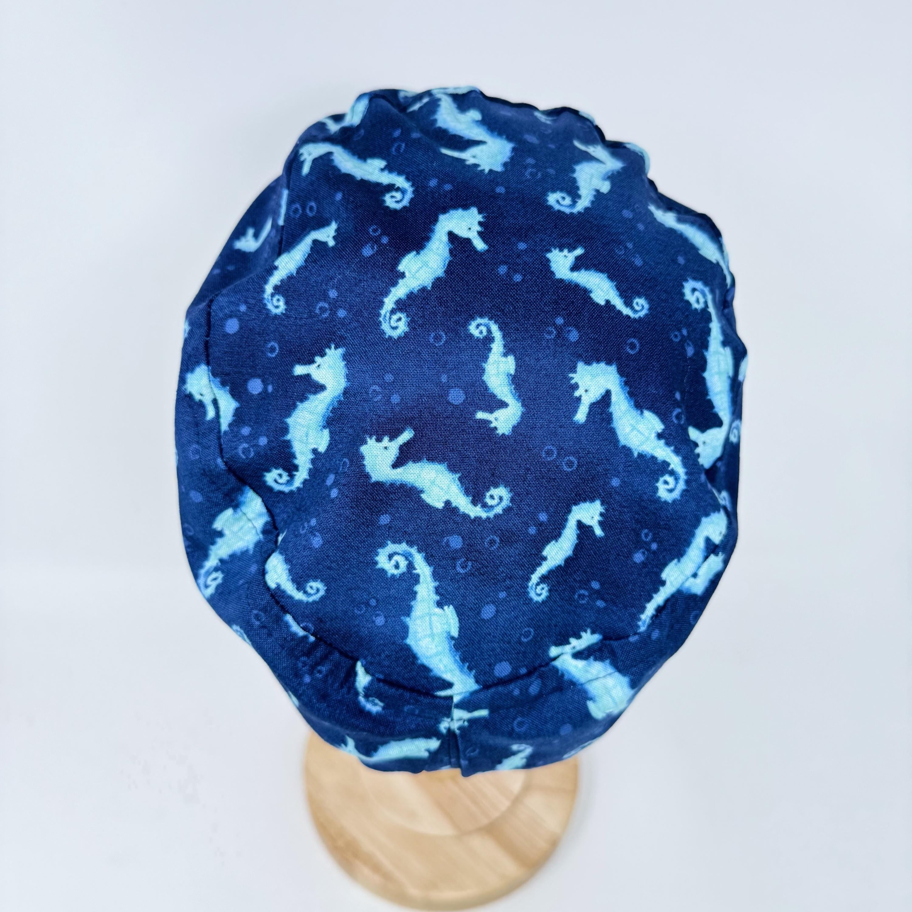 Euro scrub cap for women. Ocean Seahorse Print surgical hat with satin lined option by Paradise Caps.