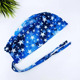 Surgical scrub cap for men. Blue Star tie back scrub hat with satin lined by Paradise Caps.