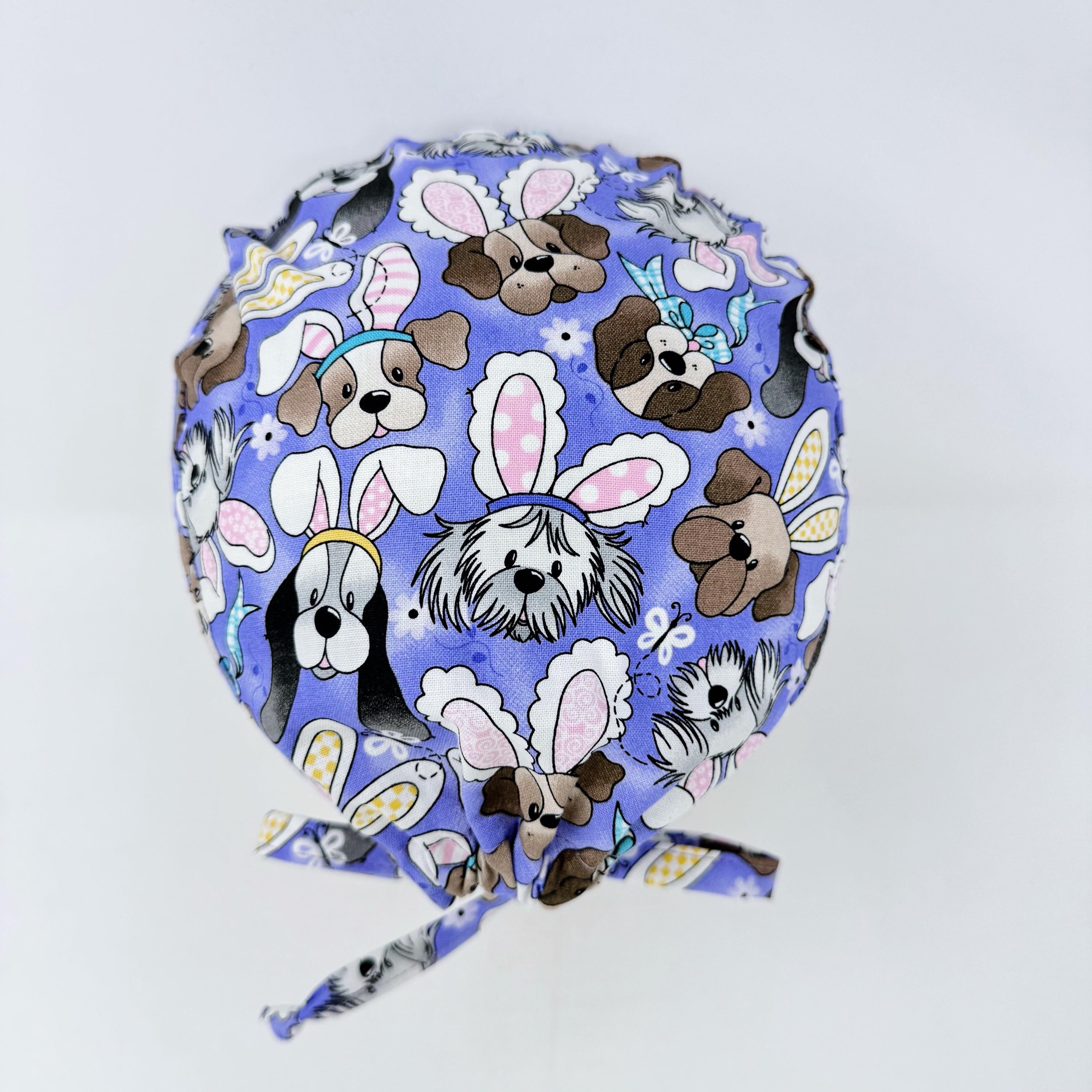 Men's surgical scrub cap. Easter Bunny & Puppy skull tie-back style scrub cap by Paradise Caps.
