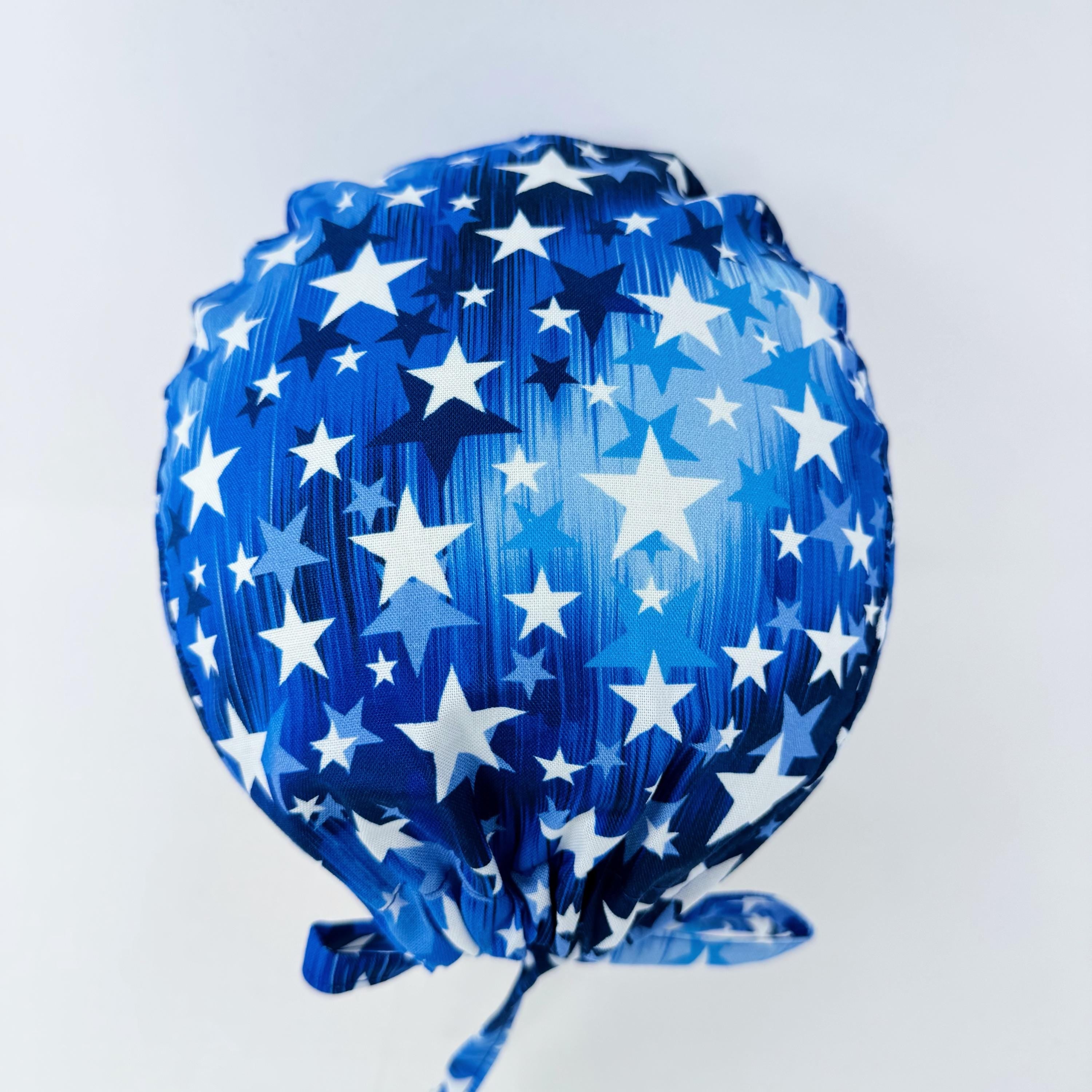 Surgical scrub cap for men. Blue Star tie back scrub hat with satin lined by Paradise Caps.