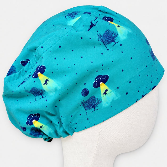 Turquoise UFO Euro scrub cap with flying saucers and yellow light beams