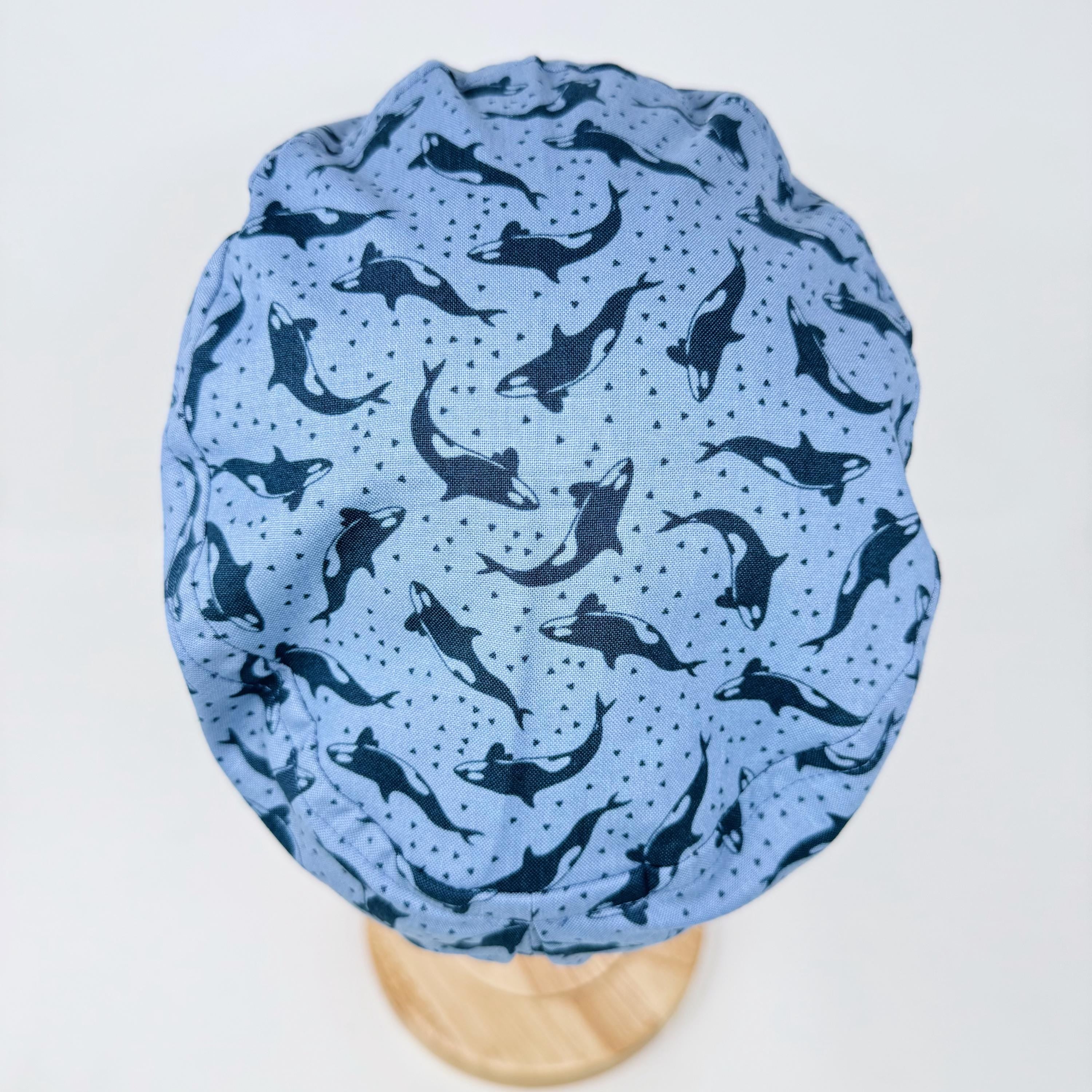 Ocean Orcas Euro scrub cap for women. Blue Sea surgical hap with satin lined option by Paradise Caps.