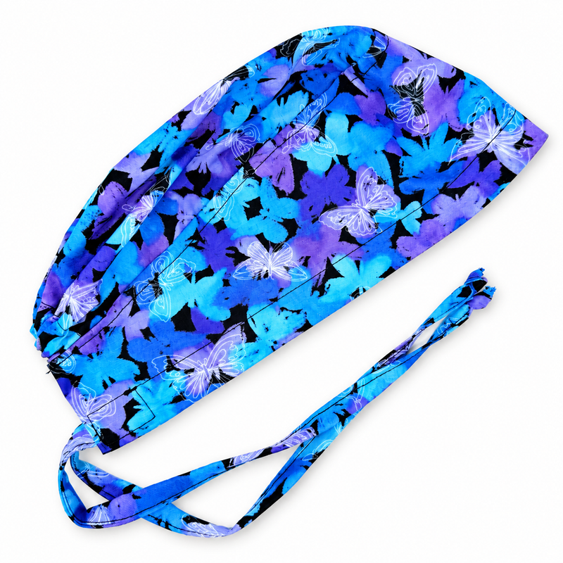 Surgical scrub cap. Butterfly Skull tie-back style scrub hat by Paradise Caps. 178 on white background with soft shadow