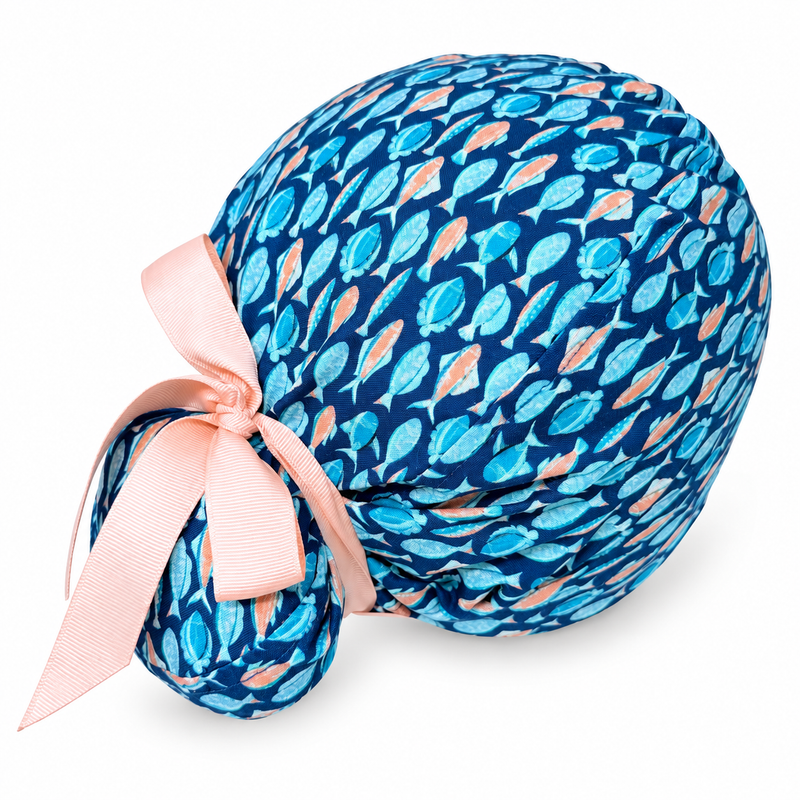 Tropical Fish Euro scrub cap with ribbon ties for women with Satin lined option by Paradise Caps. Euro PLUS style. on white background with soft shadow