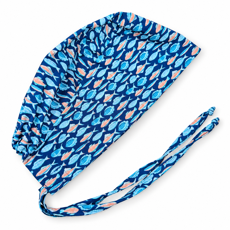 Tropical Fish Surgical scrub cap for men. Tie back scrub hat by Paradise Caps. on white background with soft shadow