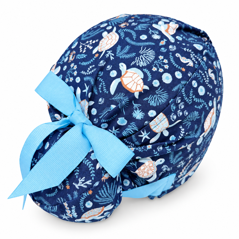 Ocean Turtles Euro scrub cap with ribbon ties for women. Sea European satin lined option surgical hat by Paradise Caps. Euro PLUS style. on white background with soft shadow