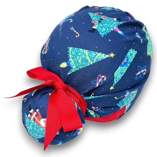 Navy Space Santa Euro Plus scrub cap with colorful Christmas trees and red ribbon ties