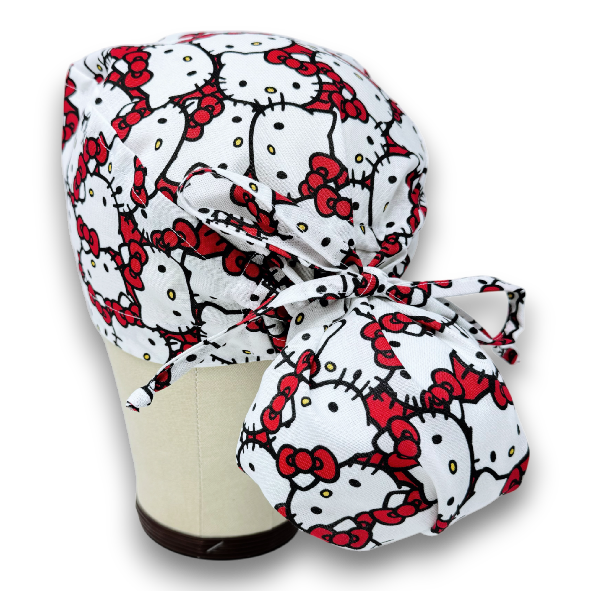 Hello Kitty Ponytail scrub cap for women with satin lined option by Paradise Caps.