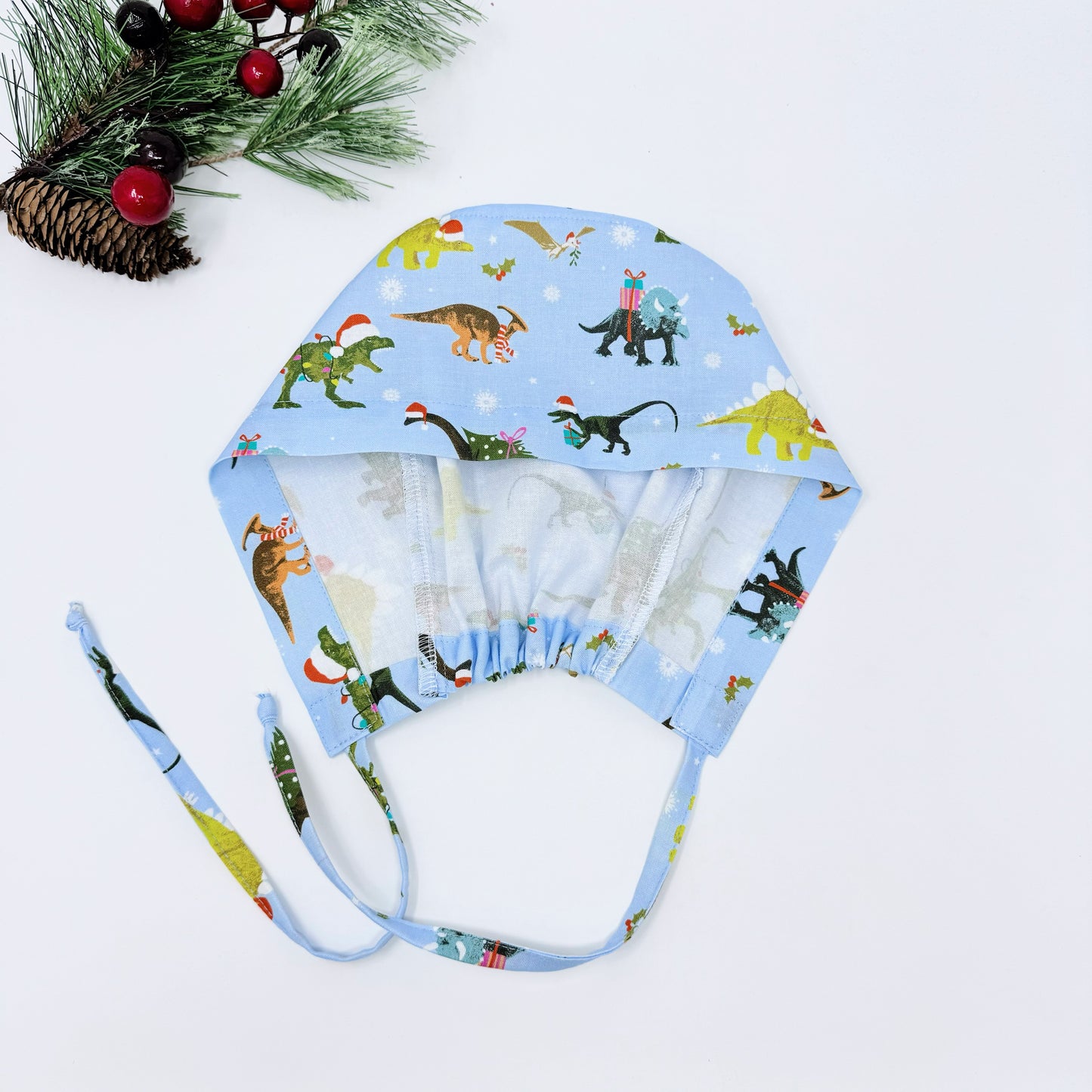 Christmas regular scrub cap. Funny surgical hat, dinosaurs print