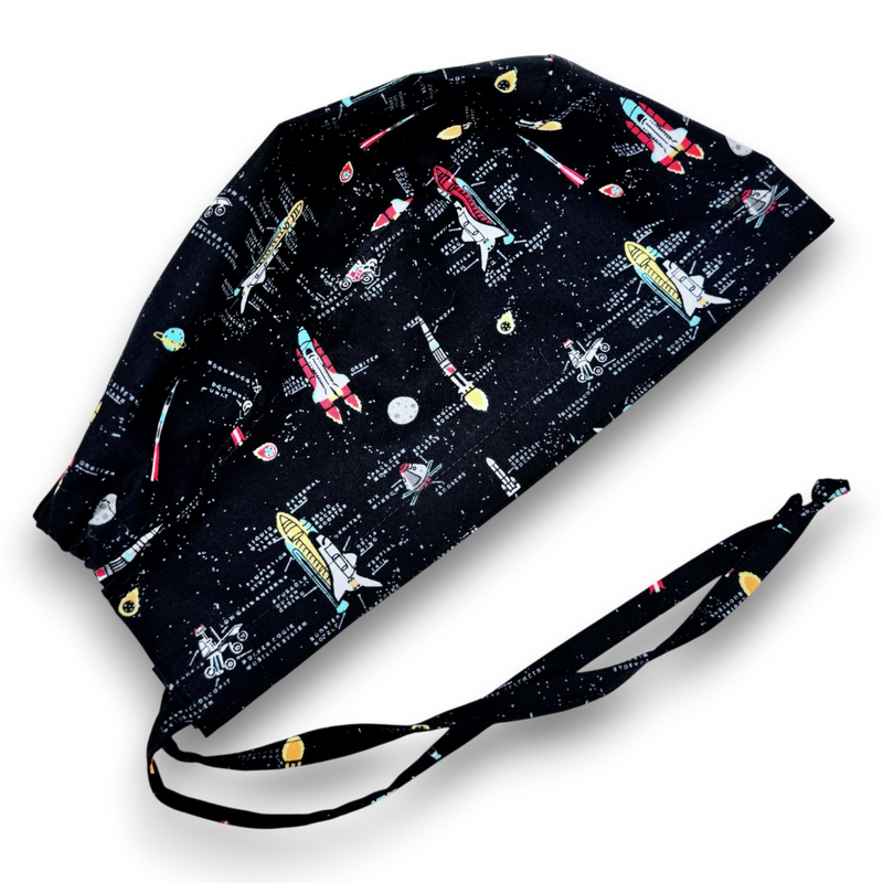 Dark space-print Regular surgical scrub cap with rockets and back ties