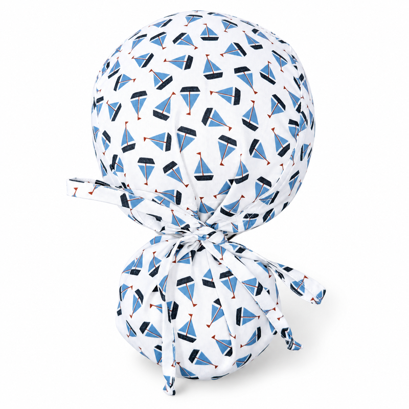 Sailboats Ponytail Scrub Cap for Women with satin lined option by Paradise Caps. on white background with soft shadow