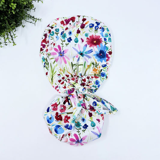 Floral ponytail scrub cap, Satin Lined Option Summer scrub cap with ponytail holder.