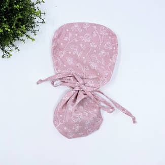 Pink and white Ponytail scrub cap for women with satin lined option by Paradise Caps.