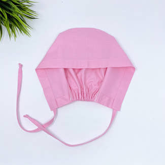 Solid pink Skull tie-back style surgical scrub cap for men by Paradise Caps.