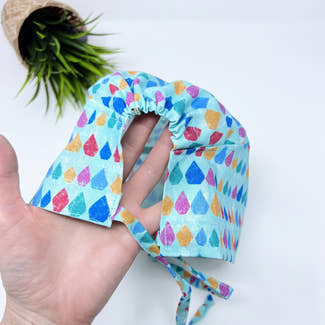 Aqua Scales Skull tie-back style surgical scrub cap for men by Paradise Caps.